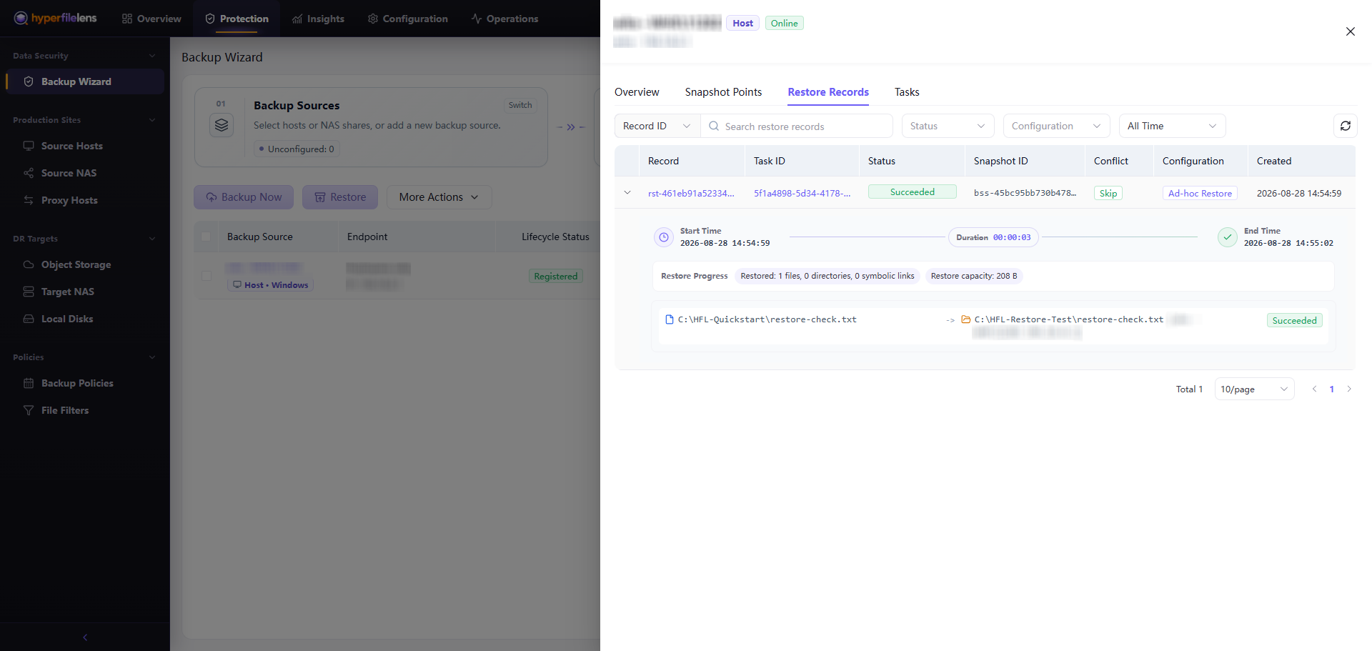 Successful single-file restore in Restore Records with host and IP information blurred while Record, Task, and Snapshot identifiers and times remain visible